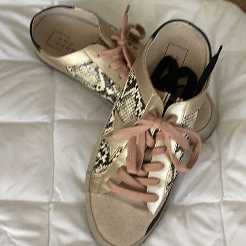 ShuShop Cream and Black Sneakers with Sleek Design